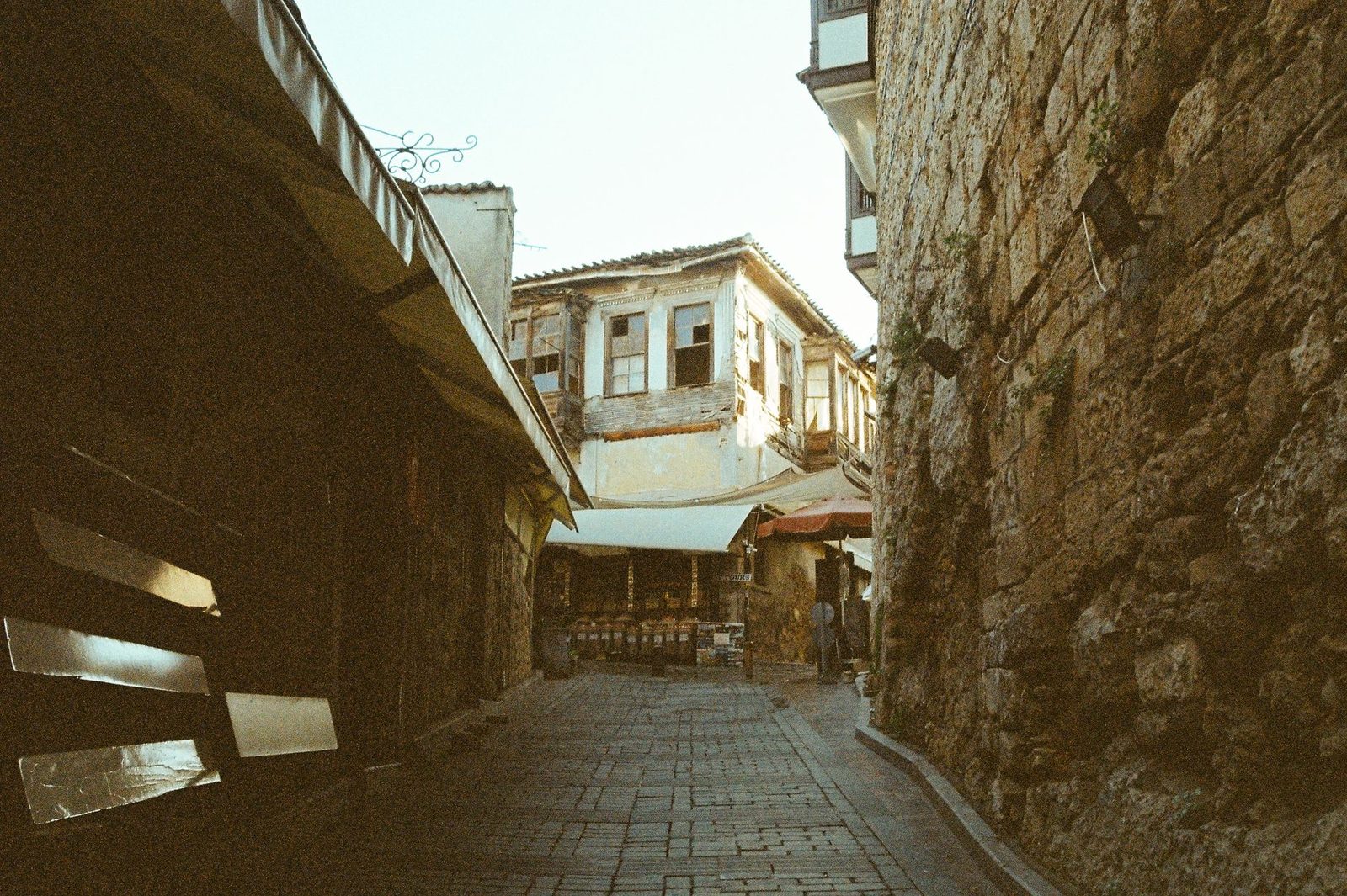 A cobbled alley between old buildings